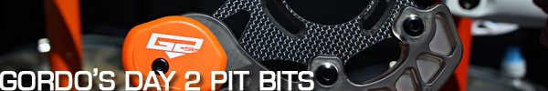 A new Specialized seat post, the Fox 34 fork, DH-ready Carbon Nomads, a custom-painted GT, DH track watering and more are in this pit bits gallery.